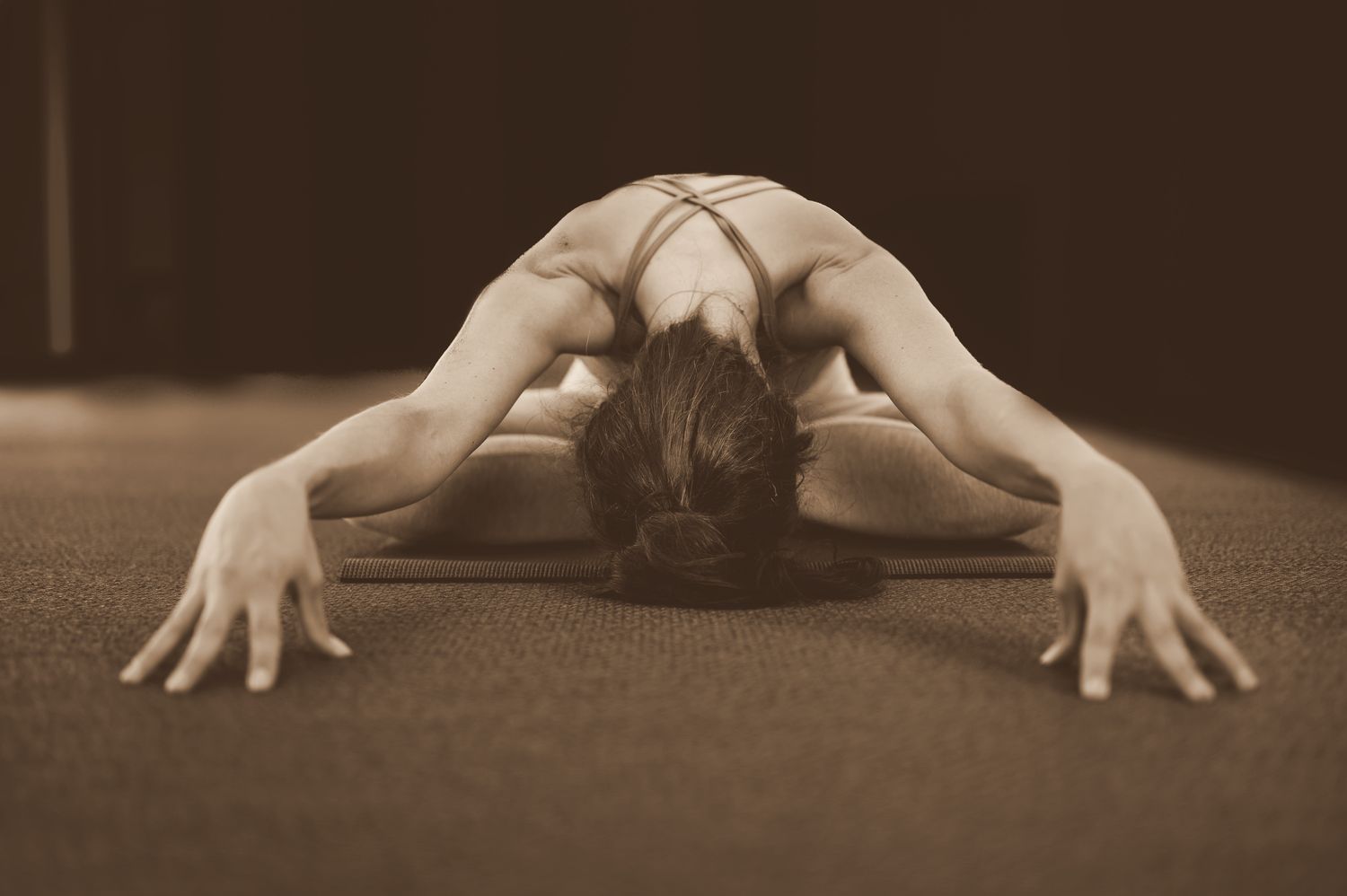 Floor yoga posture, black and white